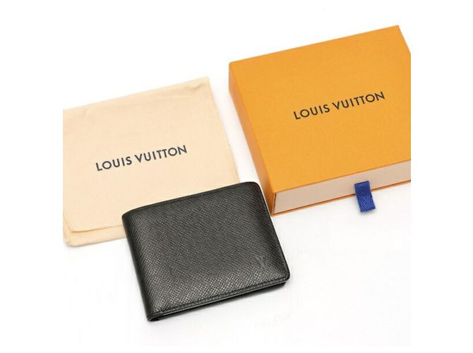 Slender Portafoglio bi-fold in pelle Taiga Louis Vuitton Nero - vista 7