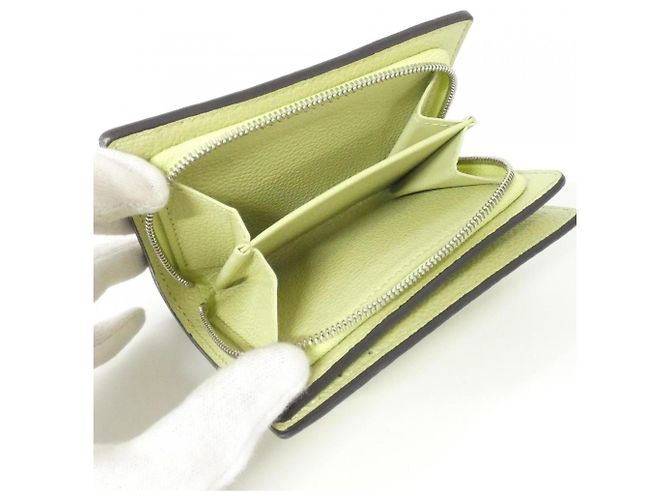 Cartera Claire Monogram Empreinte Louis Vuitton Verde Verde claro - vista 9