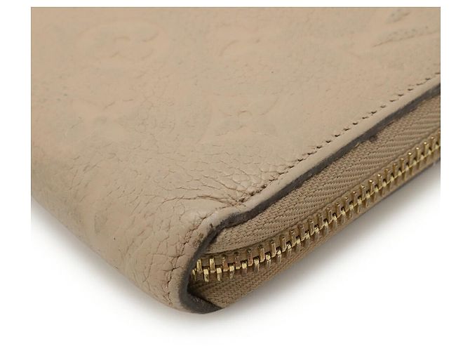 Portafoglio Zippy Monogram Empreinte Louis Vuitton Marrone Beige - vista 3