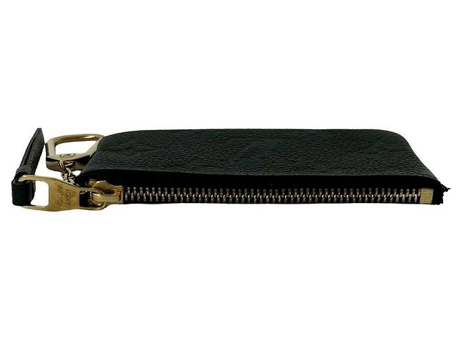Pochette Cle Monogram Empreinte em Couro da Louis Vuitton - Estojo para Moedas e Chaves Preto - vista 4