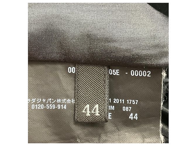 Abito senza maniche in lana e cashmere a quadri houndstooth beige / nero di Prada - vista 5