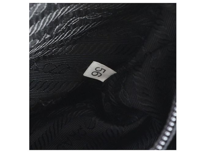 Borsa a tracolla in nylon tessuto nero con logo Prada e fibbia - vista 9