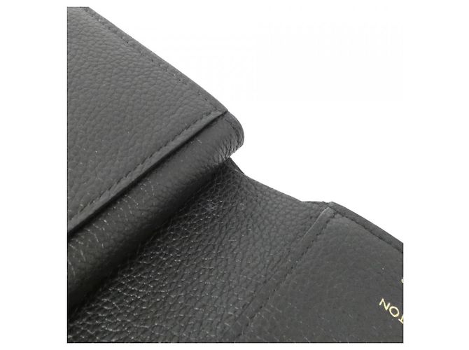 Cartera Claire Monogram Empreinte Louis Vuitton Negro - vista 7