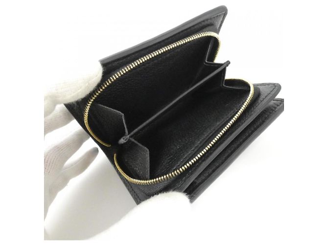 Cartera Claire Monogram Empreinte Louis Vuitton Negro - vista 8