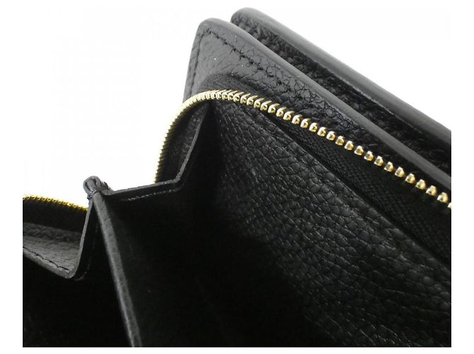 Cartera Claire Monogram Empreinte Louis Vuitton Negro - vista 9