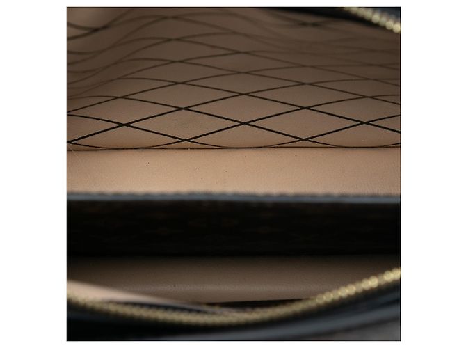Clutch Trunk Monogramma Inverso Marrone Louis Vuitton - vista 4