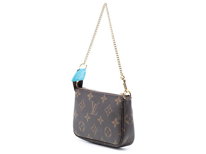 Mini Pochette Accessoires Vivienne in Monogramma Marrone a Tokyo di Louis Vuitton - vista 2
