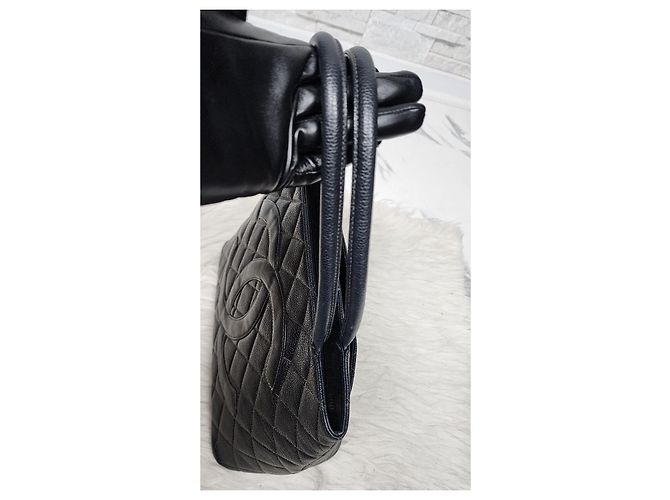 Chanel Handtasche aus Kaviarleder mit Medaillon Schwarz - Ansicht 9