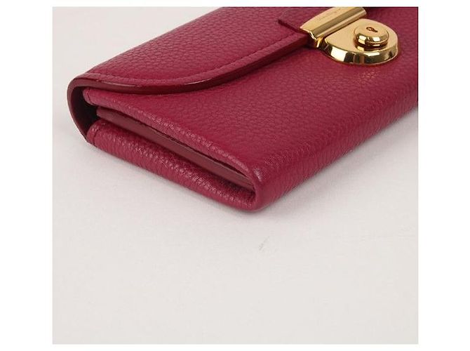 Salvatore Ferragamo Portafoglio lungo da donna Ferragamo in oro e bordeaux Rosso - vista 9