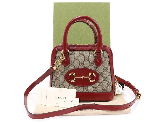 Gucci Borsa mini in pelle rossa con GG Supreme e morsetto Marrone - vista 2
