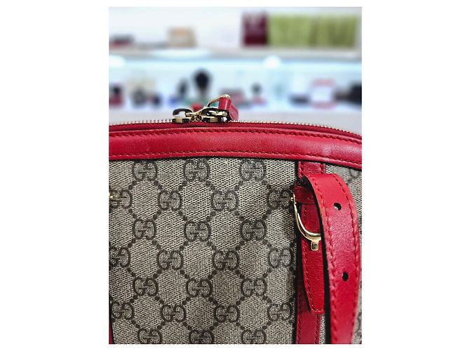 Gucci Borsa a secchiello e borsa a spalla in tela GG Supreme Rosso - vista 17