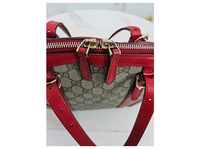 Gucci Borsa a secchiello e borsa a spalla in tela GG Supreme Rosso - vista 20