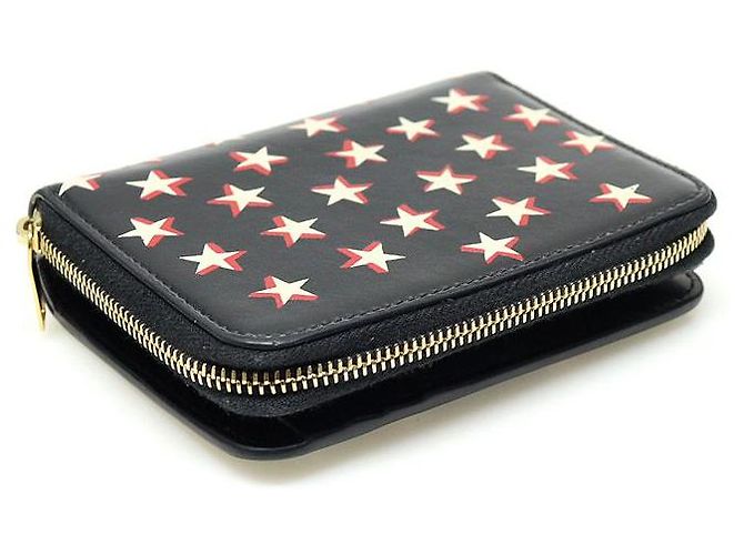 Saint Laurent Cartera compacta con cremallera de cuero negro con estampado de estrellas - vista 5
