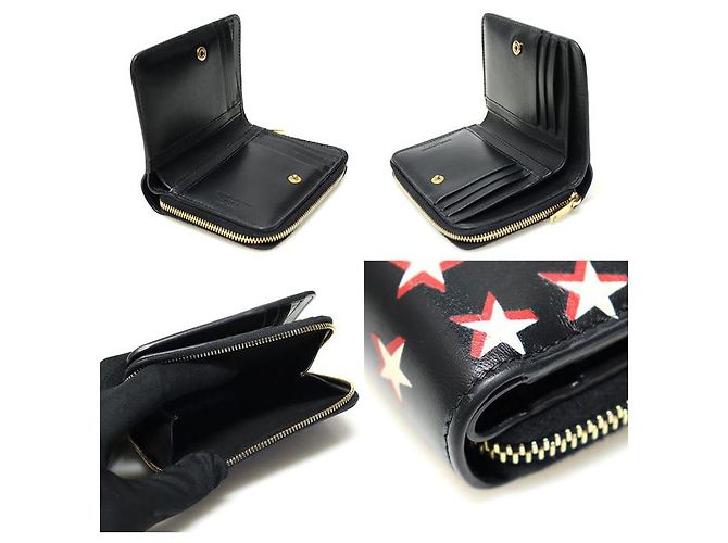 Saint Laurent Cartera compacta con cremallera de cuero negro con estampado de estrellas - vista 6