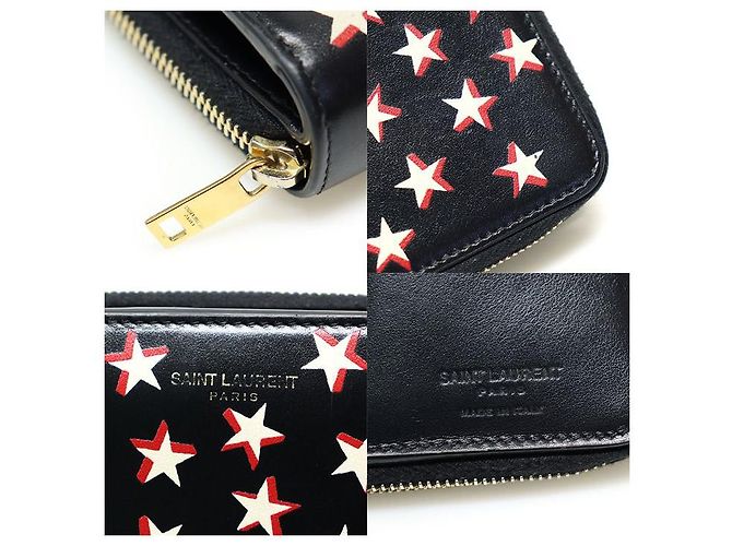 Saint Laurent Cartera compacta con cremallera de cuero negro con estampado de estrellas - vista 7