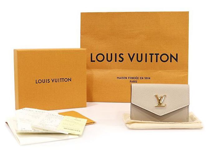 Louis Vuitton Cartera mini de piel de ternera beige greige con cierre dorado Castaño - vista 2