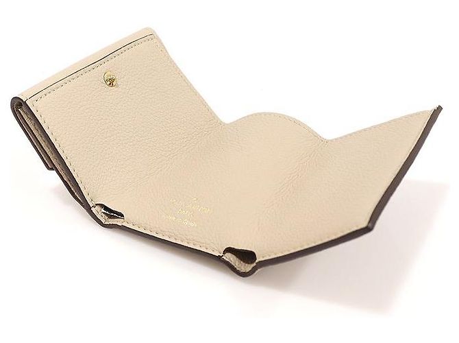 Louis Vuitton Cartera mini de piel de ternera beige greige con cierre dorado Castaño - vista 5