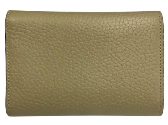 Billetera Compacta Tri-fold Capucines de Louis Vuitton Beige - vista 2
