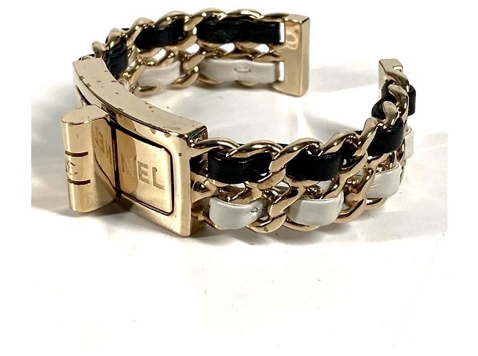 Pulsera Charm CC Logo B22A de Chanel Negro Blanco Dorado - vista 2