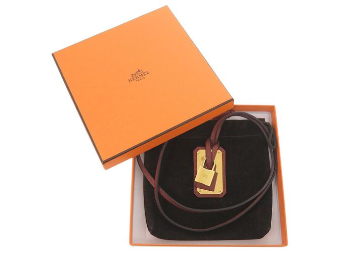 Collana Pendente Hermès O'Kelly GM in Pelle Swift Rouge H Rosso D'oro - vista 2