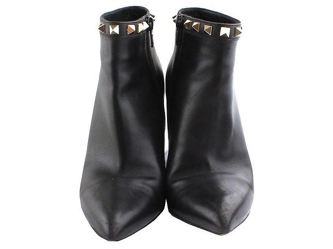 Valentino Botines Rockstud en oro negro - vista 2