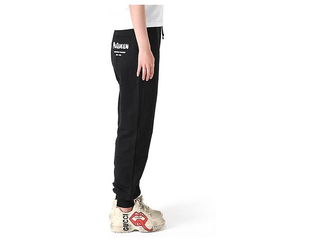 Alexander Mcqueen Pantalones de chándal con logo de graffiti negros - vista 11