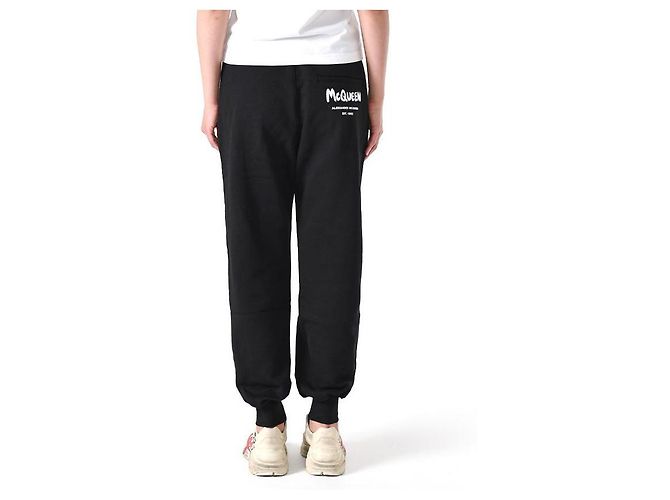Alexander Mcqueen Pantalones de chándal con logo de graffiti negros - vista 12