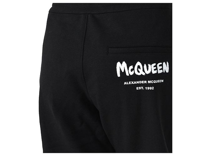 Alexander Mcqueen Pantalones de chándal con logo de graffiti negros - vista 13
