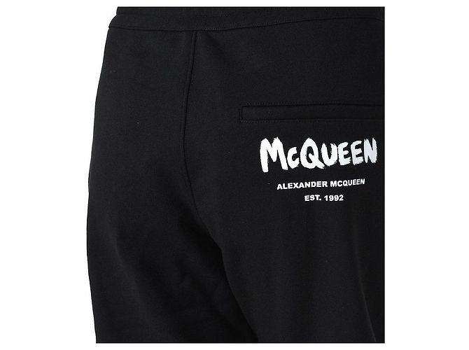 Alexander Mcqueen Pantalones de chándal con logo de graffiti negros - vista 4