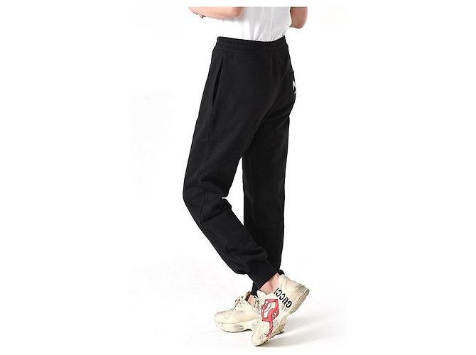 Alexander Mcqueen Pantalones de chándal con logo de graffiti negros - vista 7