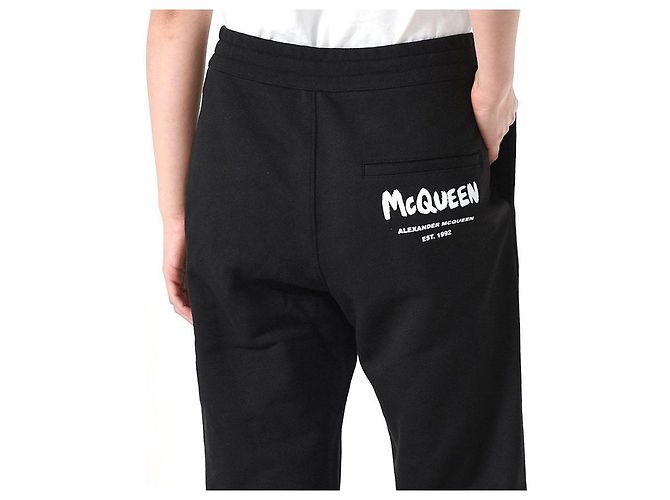 Alexander Mcqueen Pantalones de chándal con logo de graffiti negros - vista 9