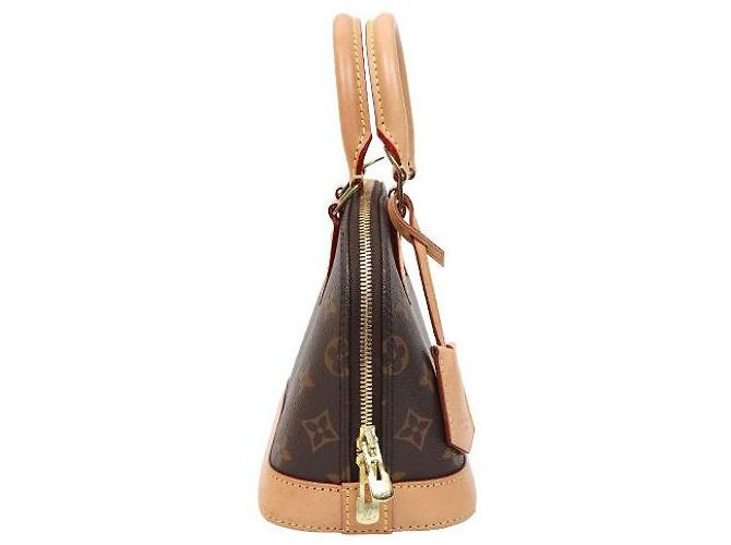 Louis Vuitton Bolso Alma Monogram Castaño - vista 2