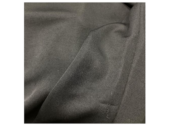 Timeless Schwarze Seidenbluse mit langen Ärmeln und perlenverzierten Knopfdetails von Chanel - Ansicht 7