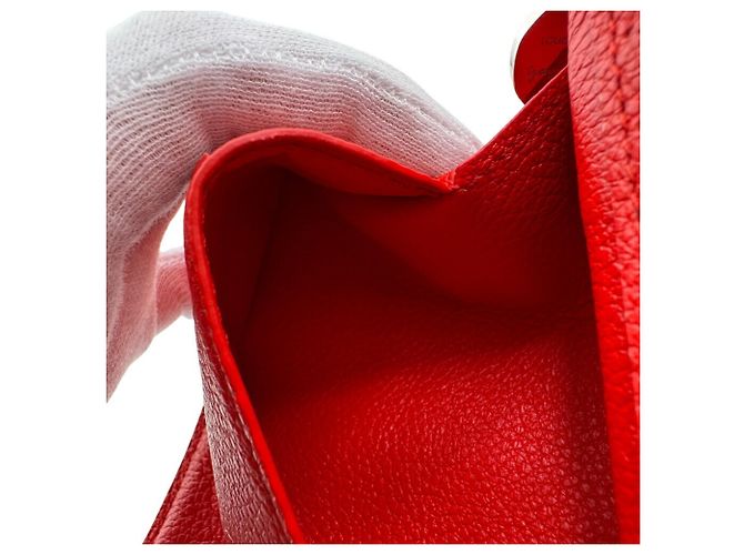 Billetera Bifold Monogram Empreinte Louis Vuitton en Rojo Blanco Roja - vista 9