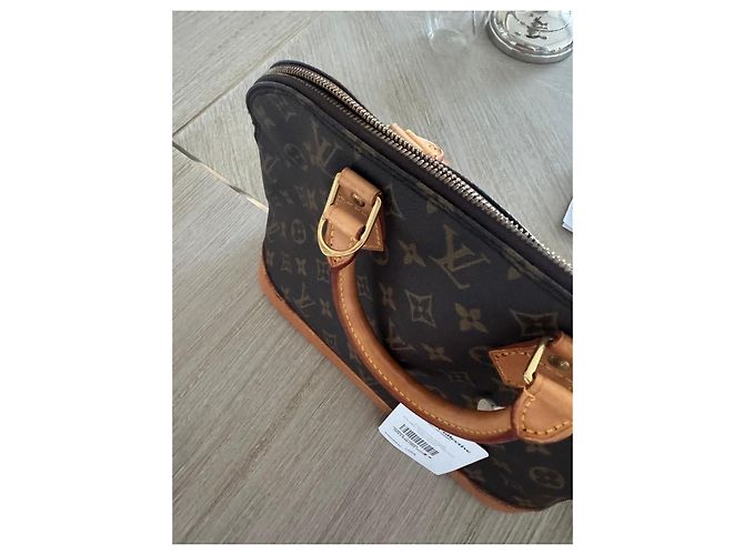Louis Vuitton Alma Handtasche aus braunem Leder - Ansicht 10