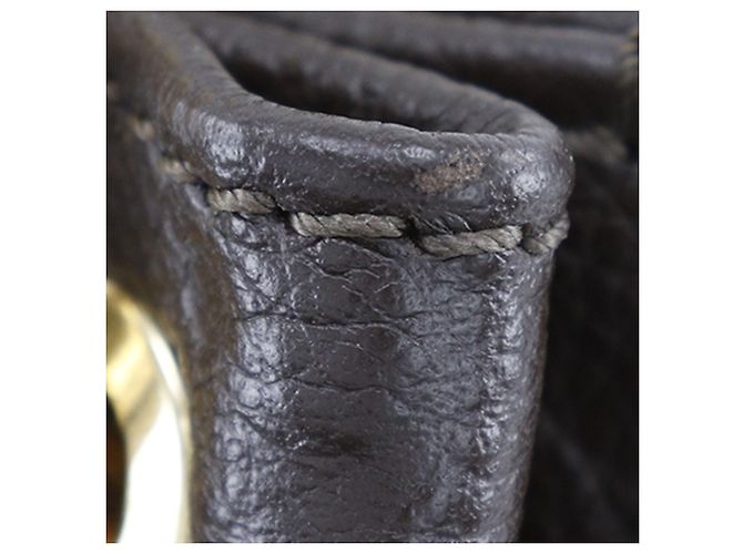 Hobo Metis Empreinte Monogram Marrone Louis Vuitton - vista 12