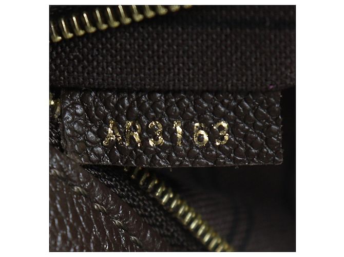 Hobo Metis Empreinte Monogram Marrone Louis Vuitton - vista 6