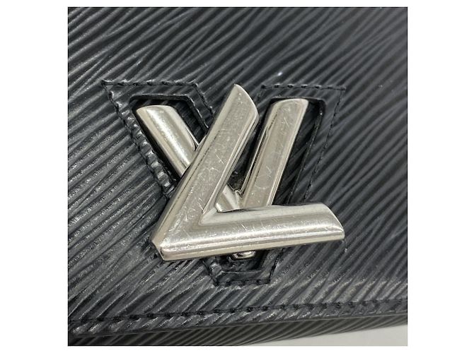 Cartera Compacta Tri-fold Twist Epi de Louis Vuitton en Noir Negro - vista 9