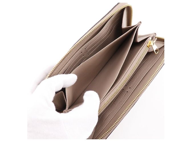 Cartera Zippy Louis Vuitton M69034 Castaño - vista 7