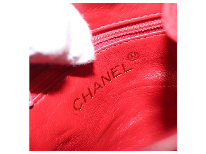 Pochette a spalla con catena CHANEL in pelle matelassé rossa con CC dorato Auth 169581 - vista 15