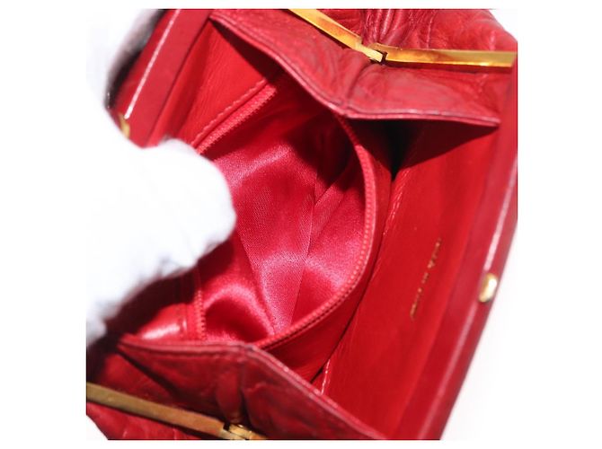 Pochette a spalla con catena CHANEL in pelle matelassé rossa con CC dorato Auth 169581 - vista 20