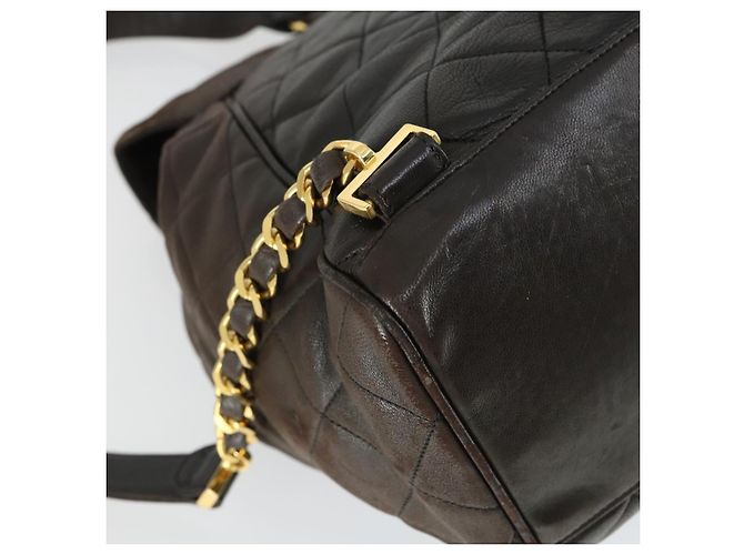 CHANEL Mochila Matelassé de Piel de Cordero Marrón Oscuro Oro CC Auth ki6346 Dorado - vista 13
