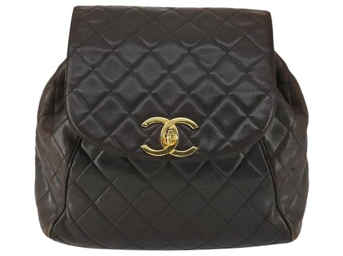 CHANEL Mochila Matelassé de Piel de Cordero Marrón Oscuro Oro CC Auth ki6346 Dorado - vista 2
