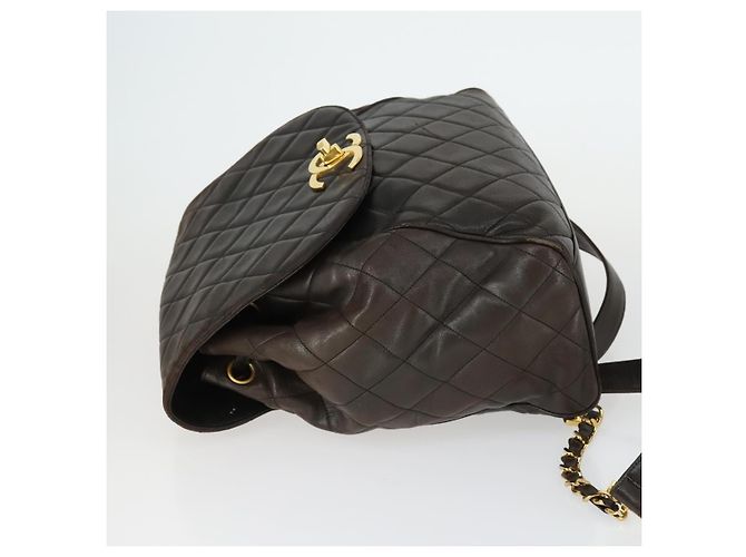 CHANEL Mochila Matelassé de Piel de Cordero Marrón Oscuro Oro CC Auth ki6346 Dorado - vista 5