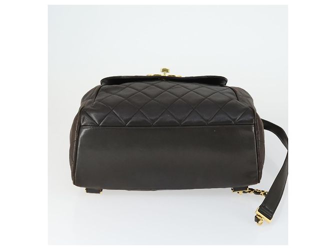 CHANEL Mochila Matelassé de Piel de Cordero Marrón Oscuro Oro CC Auth ki6346 Dorado - vista 9
