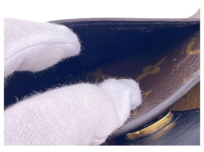 Louis Vuitton Monogram Reverse Bi-fold Wallet Brown - view 11