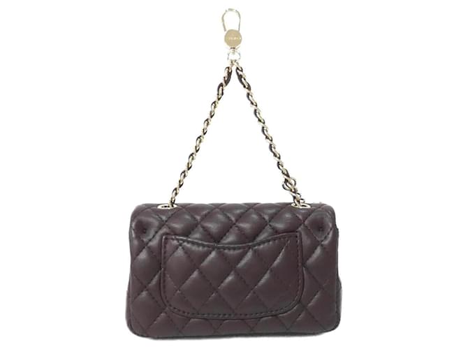 Charm per borsa Chanel in marrone e oro D'oro - vista 2