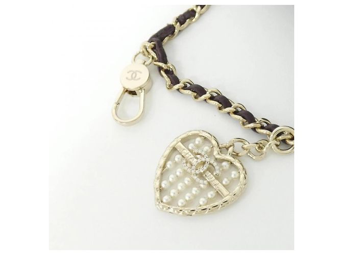 Charm per borsa Chanel in marrone e oro D'oro - vista 4