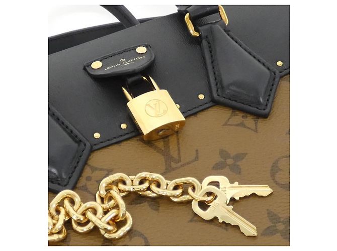 Borsa City Malle Monogram Reverse Louis Vuitton Marrone - vista 4
