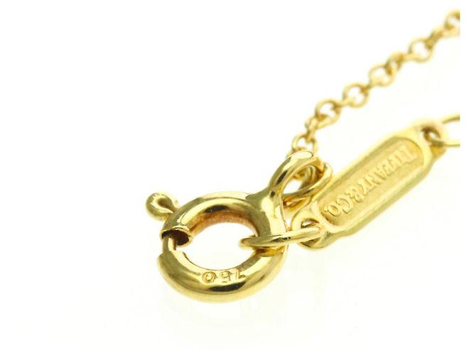Tiffany & Co Collar Péndulo de Diamante Cruzado Tiffany Dorado - vista 12